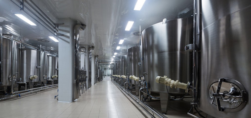 Wine cisterns under temperature control in winery