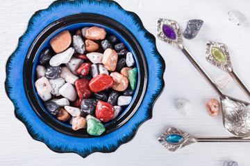 Oriental sweets,candies,pebbles, in traditional Turkish ceramic dishes.selective focus.