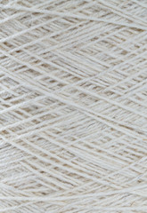 close up of wool thread bobbin