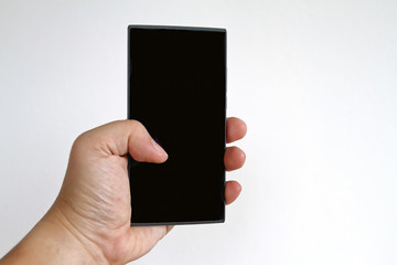 Hand holding smart phone isolated on white background