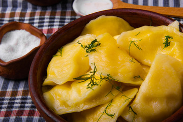 Vareniks  with sour cream and dill - national ukrainian cuisine.
