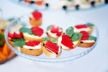 sandwiches with cheese and strawberries