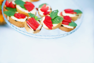 sandwiches with cheese and strawberries