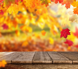 Naklejka na ściany i meble Autumn background with empty planks