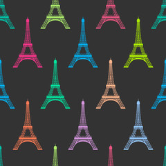 Nahtloses Muster mit bunten Silhoutten vom Eiffelturm in Paris bei Nacht