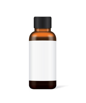 Brown glass bottle with white label have a black cap. Ideal for medicine bottle mock up or serum container and other.