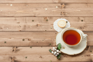 Cup Of Tea. Mince Pie. Shining Stars. Wooden Background With Cop