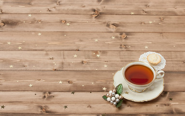 Cup Of Tea. Mince Pie. Shining Stars. Wooden Background With Cop