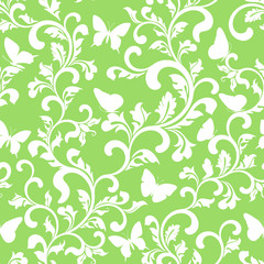 Seamless pattern with plants and butterflies on a green background