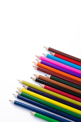 Colour pencils isolated on white background close up