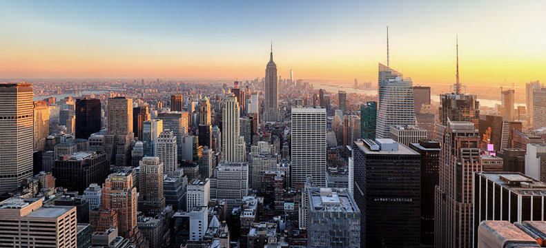 New York City. Manhattan downtown skyline with illuminated Empir