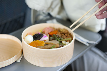 Bento, or obento, box with Japanese food