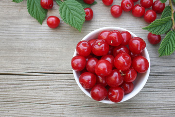 ripe berry cherry in a bowl on the table