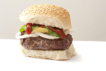 Cheese burger on a fresh sesame bun