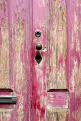 Old rustic wooden shabby door, close up
