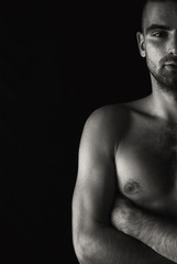 Fototapeta premium Half portrait with torso of young man