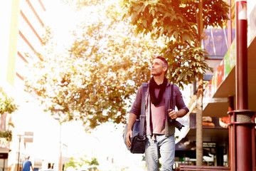 Male tourist in city