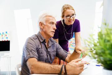 Co-workers working together