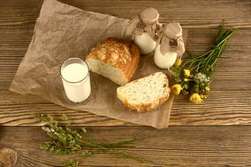 Natural dairy products in a rustic style on the wooden background