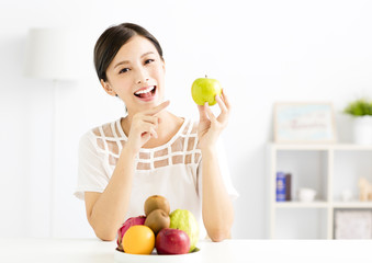 young beautiful woman with healthy fruit