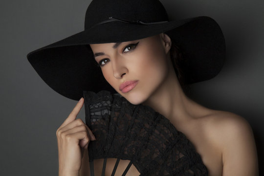 Beautiful Woman Wearing Black Hat