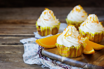 Homemade cupcakes with oranges