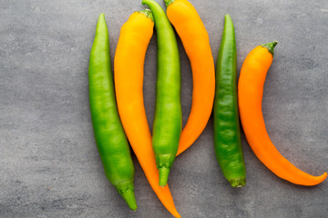 Chilli pepper on the grey background.