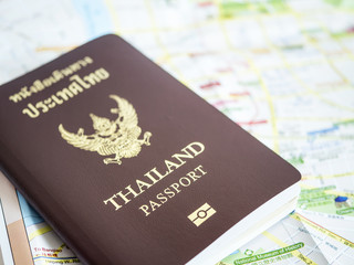 Thailand passport on paper map 1
