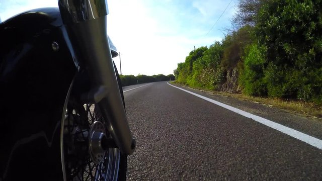 classic bike on the road seen from the fork
