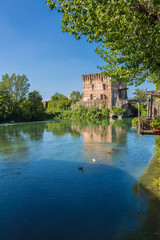 Fototapeta premium medieval building upon the Mincio river in Borghetto