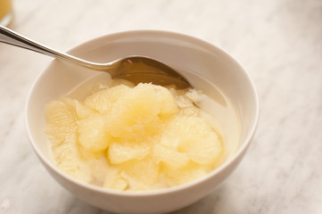grapefruit segments in a bowl