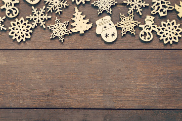 Wood christmas decoration on wood background with copyspace.