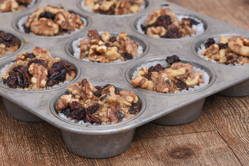 Fresh walnut muffins in pan