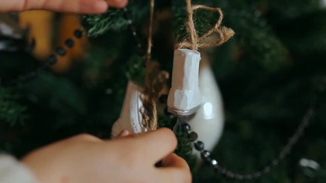 Woman decorating the Christmas tree