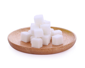 Cubes of sugar on the white background