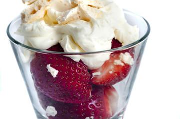 Ripe fresh strawberries served with cream