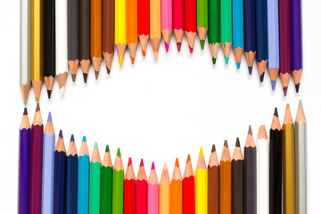 Row of color pencil on white background