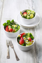 Healthy salad with lamb's lettuce (Valerianella locusta), strawb
