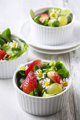 Healthy salad with lamb's lettuce (Valerianella locusta), strawb