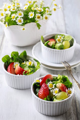 Healthy salad with lamb's lettuce (Valerianella locusta), strawb