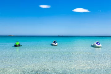 Photo sur Plexiglas Plage de Palombaggia, Corse Jet ski mooring in the turquoise water of  Rondinara beach in Co