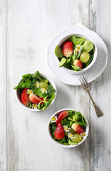 Healthy salad with lamb's lettuce (Valerianella locusta), strawb