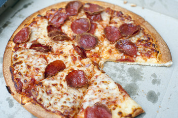 Takeaway pepperoni pizza