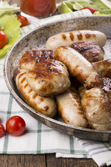 Grilled chicken sausages and burgers.