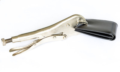Locking Pliers hold a black wallet money