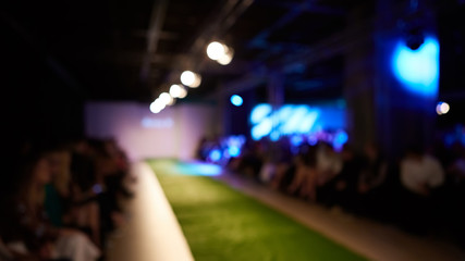 Fashion runway out of focus, blur background.