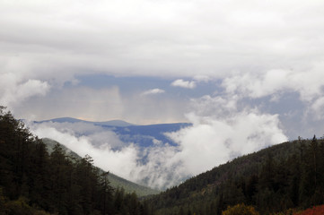 Altay mountains with fog and clouds after rain, Russia, Siberia
