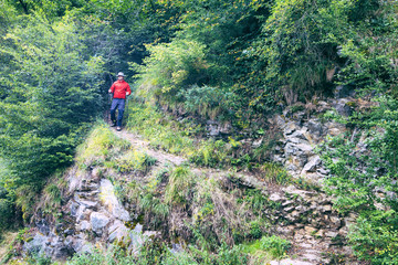 Fototapeta na wymiar lone hiker in the mountains