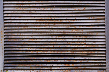 Old rusty ventilation grille