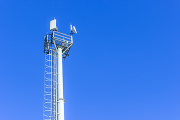 Cellular antenna against blue sky